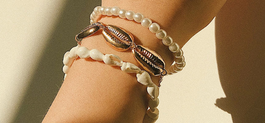 Combine shell bracelets with pearls