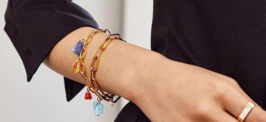 charm bracelet on wrist