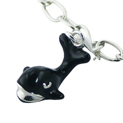 Whale shaped casted nautic and marine black enamel sterling silver charm