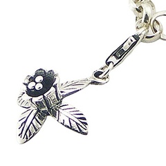 Exquisite Flower Charm Encircled By Ornate Silver Leafs