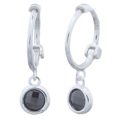 Black cubic zirconia dangle charm on huggie hoop earrings in silver by BeYindi