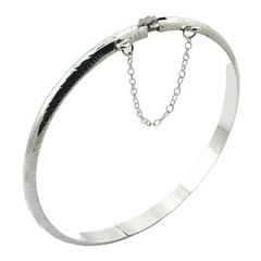 Small Delicate Ornament On Convexed Sterling Silver Bangle by BeYindi