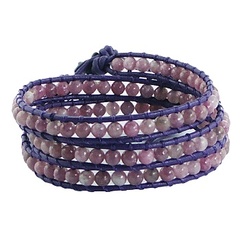 Triple row wrap bracelet with tourmaline gemstones on purple leather