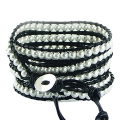 Wrap bracelet with imitation pearls on black leather 